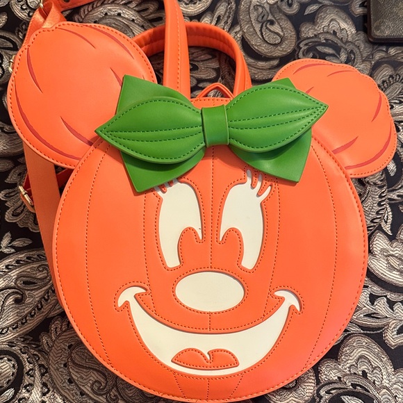 Loungefly Handbags - Loungefly Orange Pumpkin Minnie Backpack with Green Bow
